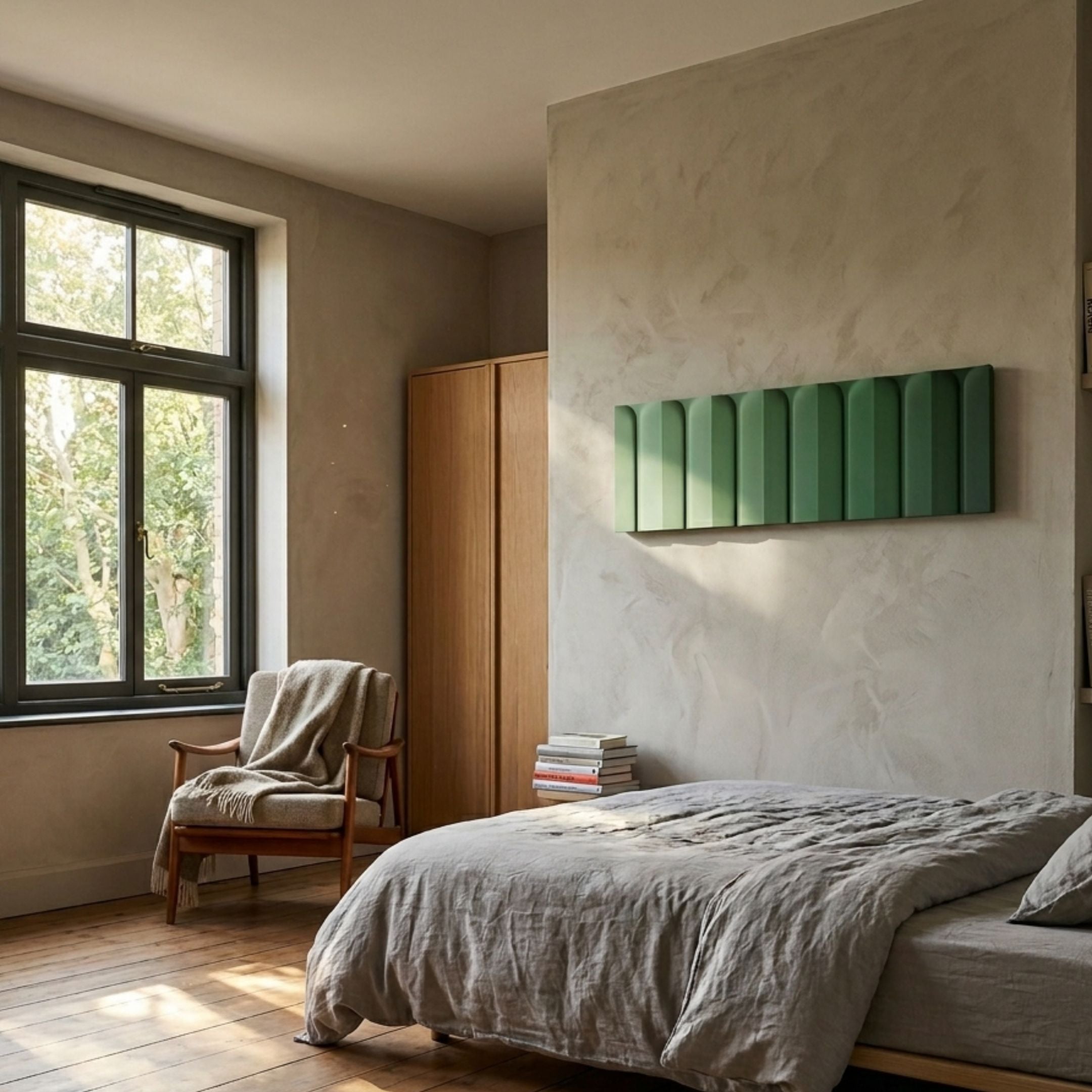 Vireus Green Single Panel 3D Wood Relief Wall Art by Giant Sculptures mounted above a linen-dressed bed in a bedroom with oak wardrobe and armchair.