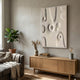 Terravura Rectangular Sandstone II 3D Wood Relief Wall Art in white-framed sandstone-textured relief, mounted above an oak sideboard in a modern living room.