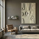 Terravura Rectangular Sage Green II 3D Wood Relief Wall Art displayed above a grey sofa in a modern living room with a leather armchair and shelf decor.
