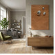 Verdara Terracotta Wood Relief 3D Wall Art by Giant Sculptures, with flowing wavy lines and three silver accents, mounted above a wooden sideboard in a living room.