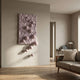 Fluxion Soft Pink 3D Wood Relief Wall Art With Metal Ball displayed in a neutral living room with grey sofa, knit cushion, and desk near a doorway.