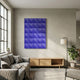 Ondula Textured Iris Blue Wood Relief 3D Wall Art by Giant Sculptures, displayed above a wooden console in a modern living room with a grey sofa and floor lamp.