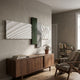 Axentra Deep Green & White Geometric Wood Relief 3D Wall Art by Giant Sculptures displayed above a walnut sideboard in a modern living room with armchair.