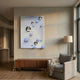 Sphera Gradient 3D Wood Relief Wall Art by Giant Sculptures with blue and silver spheres on white carved waves, displayed above a walnut sideboard beside a linen armchair.