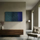 Spectrum Weave Horizontal Midnight Blue Wood Relief 3D Wall Art displayed above a walnut sideboard in a minimalist living room with a linen chair and floor lamp.