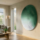 Fluctus Green Textured Sandstone Wood Relief 3D Wall Art mounted on a cream living room wall above a linen sofa, floor lamp, and oak coffee table.