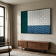 Trelume Wavy Wood Relief 3D Wall Art by Giant Sculptures, with carved white, teal, and blue sections, mounted above a walnut sideboard in a sunlit living room.