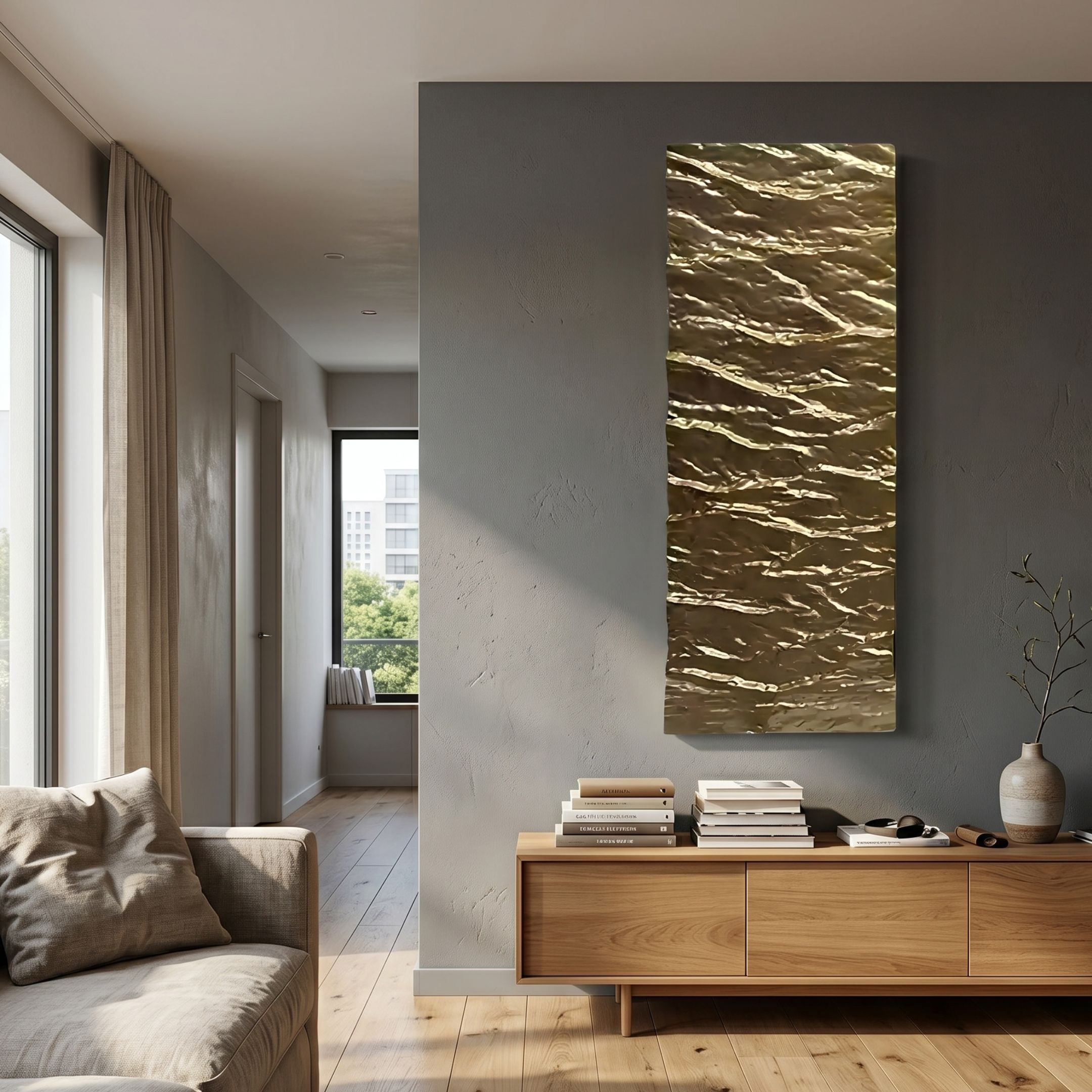 Illume Gold I Hand-Painted Wood Relief 3D Wall Art by Giant Sculptures, vertical crinkled gold panel on a grey wall above an oak console in a modern living room.