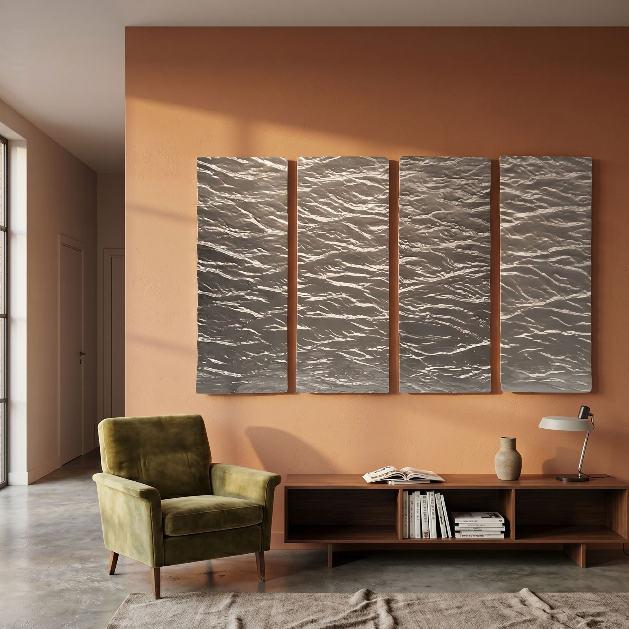Illume 4-Panel Silver Hand-Painted Wood Relief 3D Wall Art by Giant Sculptures mounted on a terracotta wall above a walnut console and olive velvet armchair.