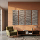 Illume 4-Panel Silver Hand-Painted Wood Relief 3D Wall Art by Giant Sculptures mounted on a terracotta wall above a walnut console and olive velvet armchair.