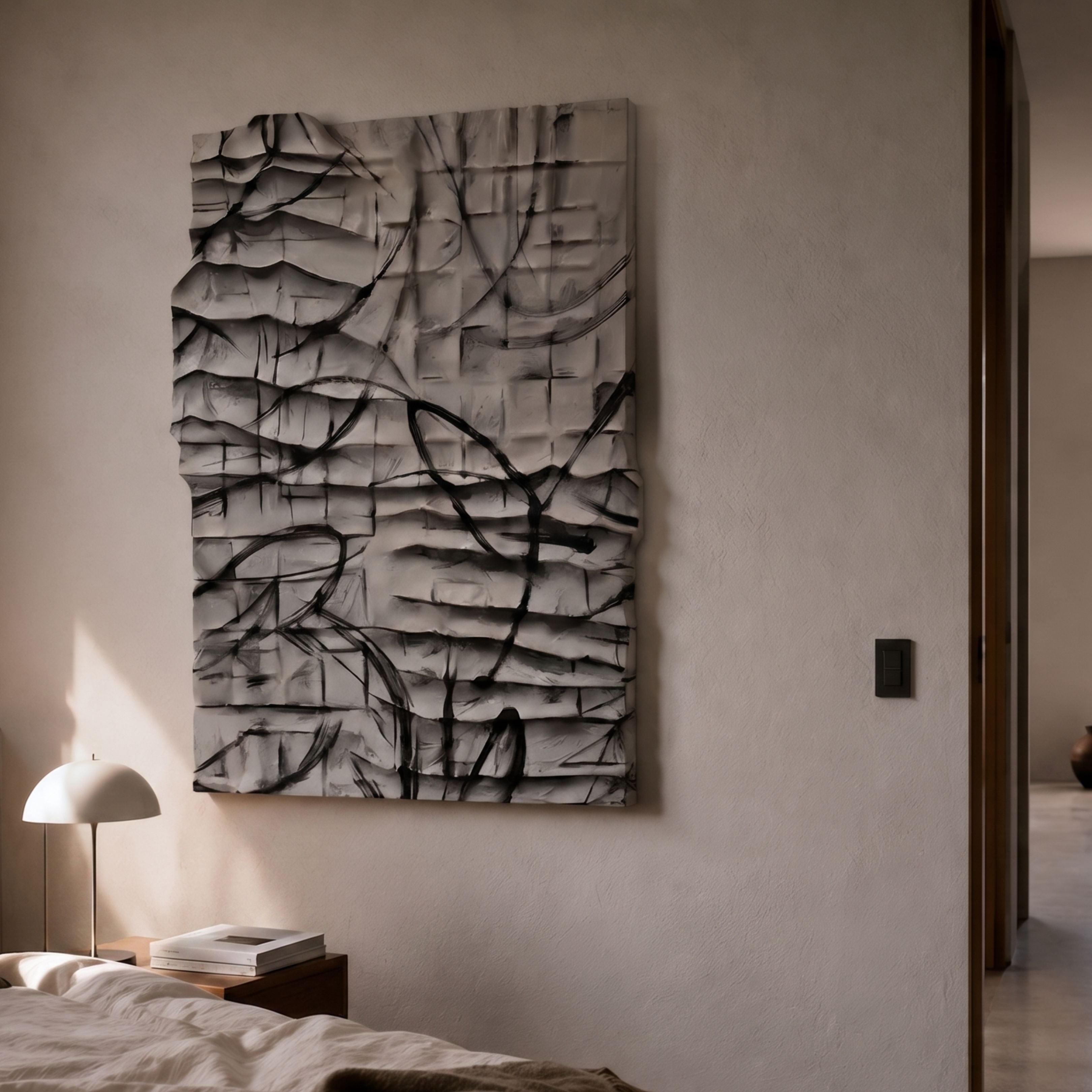 Calidora Abstract Contour Textured 3D Relief Wall Art by Giant Sculptures, a grey sculpted grid panel with black contour linework, mounted above a bedside table with a domed lamp in a neutral bedroom.