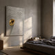 Ondella Gold Ripple III Sandstone Wood Relief 3D Wall Art by Giant Sculptures, mounted in a bedroom above a wooden nightstand beside a bed with grey linens.
