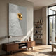 Ondella Gold Ripple II Sandstone Wood Relief 3D Wall Art by Giant Sculptures displayed above a walnut sideboard in a sunlit living room with bookshelves.