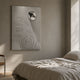 Ondella Silver Ripple IV Sandstone Wood Relief 3D Wall Art by Giant Sculptures, displayed above a linen-dressed bed in a neutral wabi-sabi bedroom.