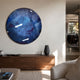 Vitreon 3D Sapphire Crystal Porcelain Wall Art by Giant Sculptures, a round deep-blue gemstone disc displayed above a walnut sideboard in a modern living room.