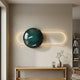 Vitreon 3D Teal Crystal Porcelain With Gold Frame Wall Art by Giant Sculptures, mounted above a wooden console with a vase in a modern hallway setting.