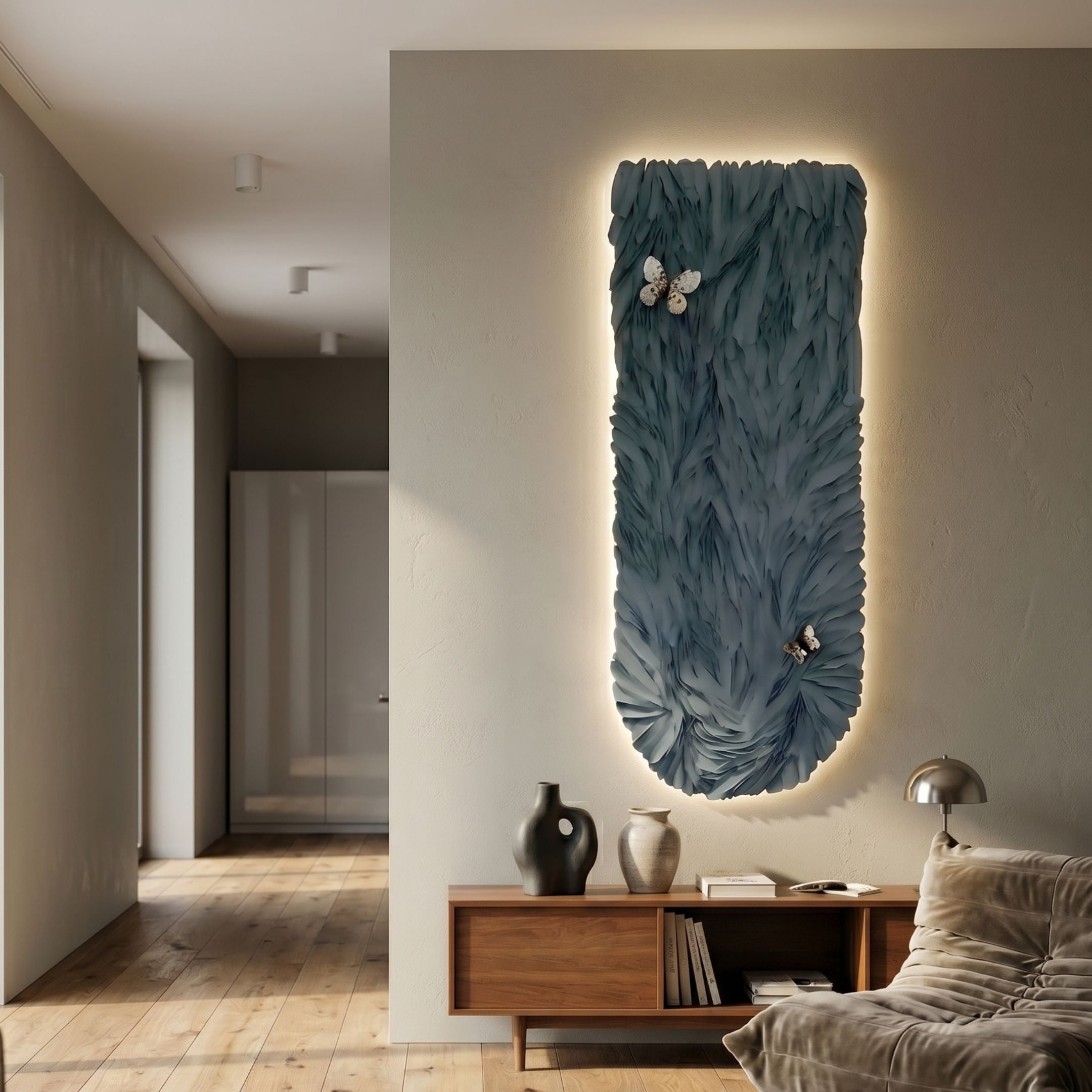 Blossom Deep Ocean Blue Leather 3D LED Wall Art by Giant Sculptures with layered leaf texture and butterfly accents, backlit above a wooden console in a modern living room.