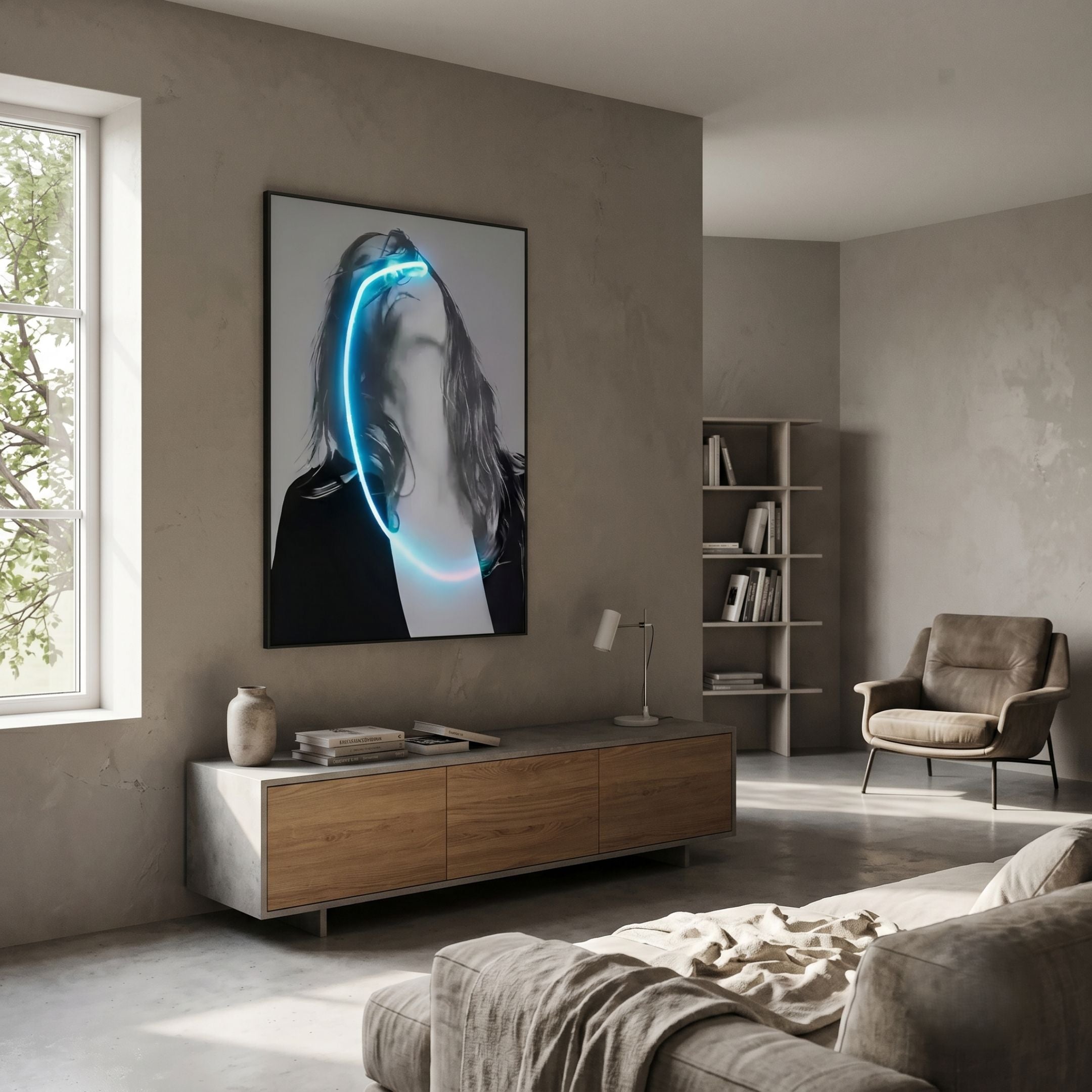 Elysian Veiled Grace 3D LED Wall Art by Giant Sculptures displayed above a wooden sideboard in a modern grey living room with armchair and bookshelf.