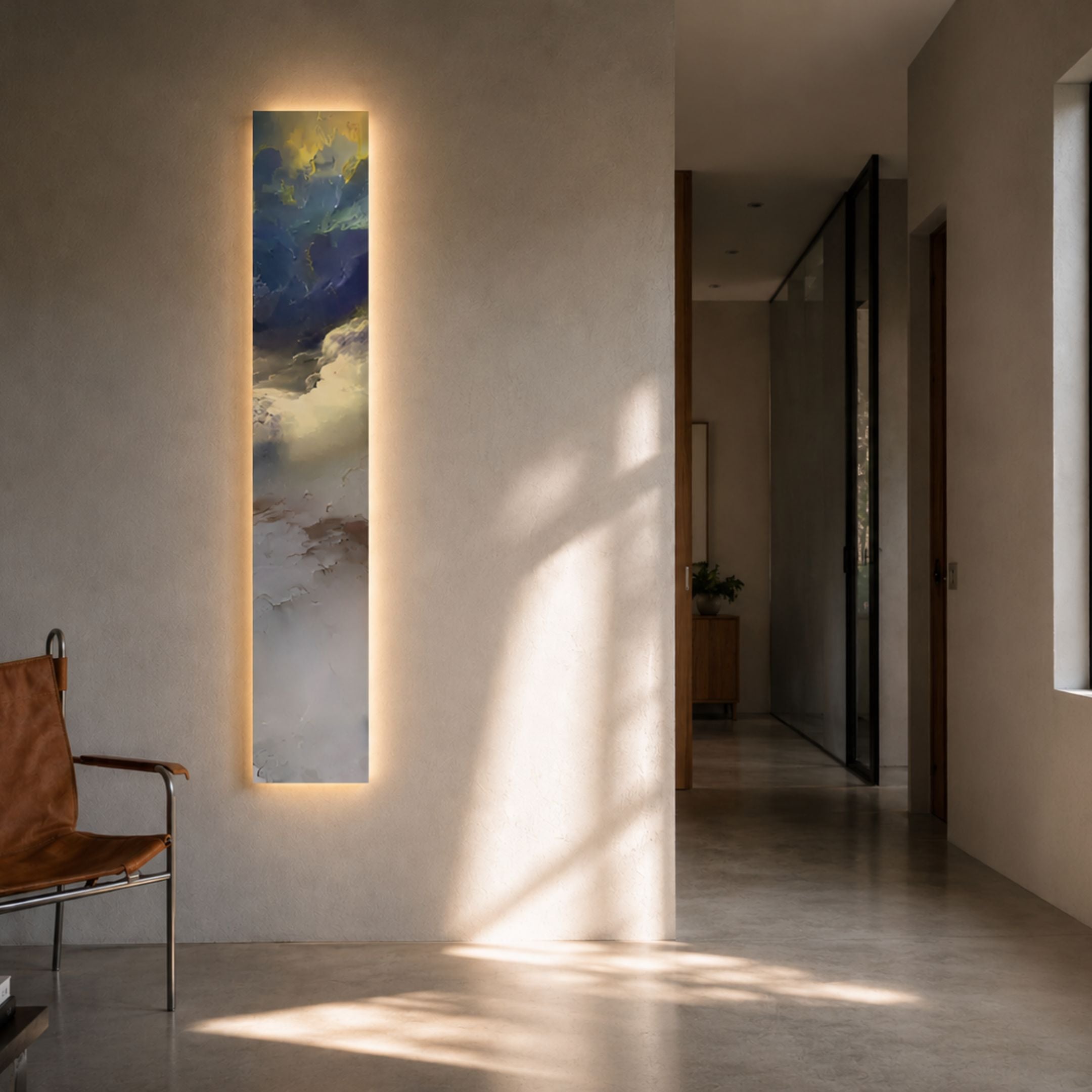 Chroma Gold Radiant Veins LED Wall Art Canvas by Giant Sculptures, a tall vertical piece with blue and gold cloud forms, glowing on a beige hallway wall.