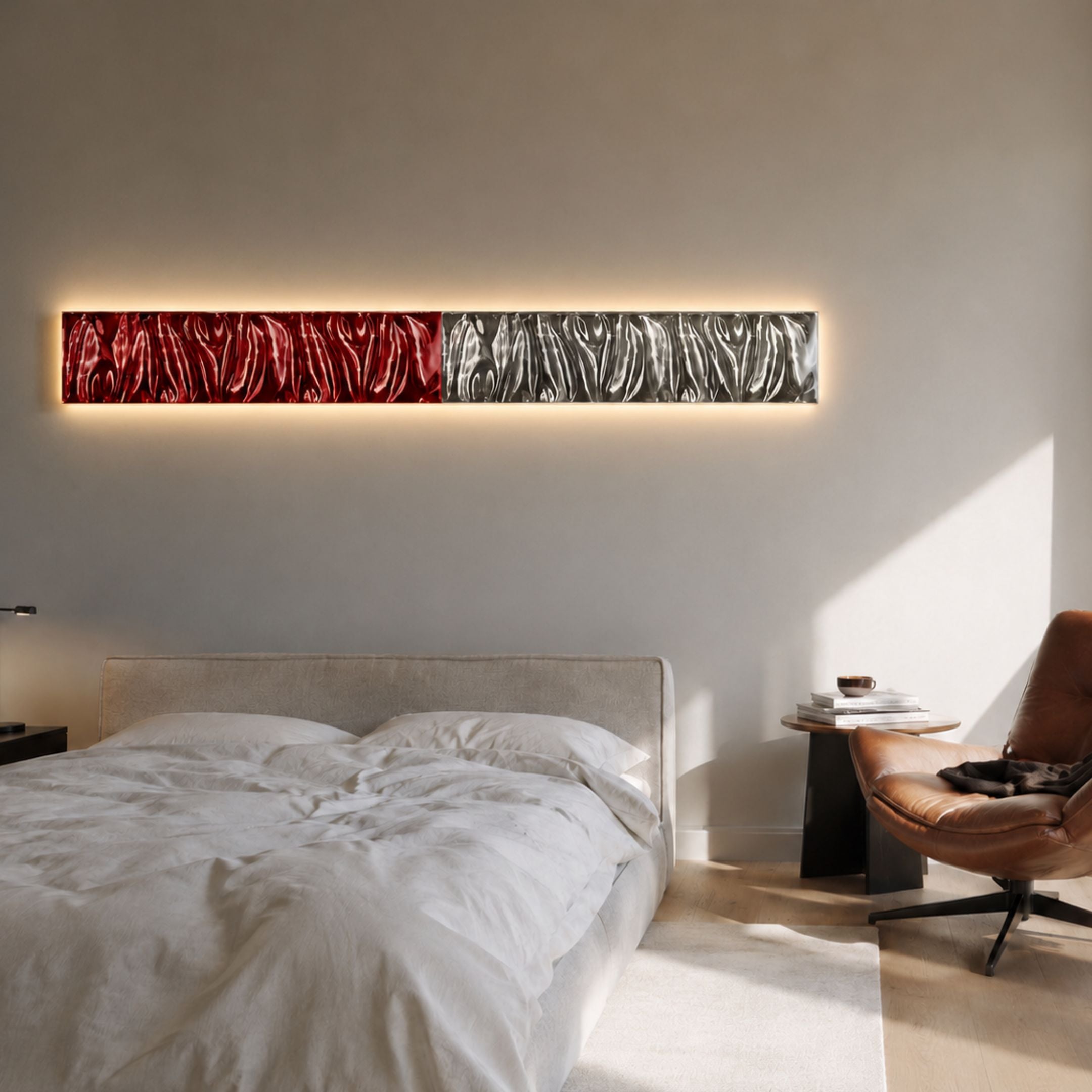 Textura 3D Red And Silver Leather Design Wall Art by Giant Sculptures mounted with backlighting above an upholstered bed, beside a tan leather chair.