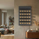 Zenith Black 3D Acrylic LED Layered Illumination Wall Art by Giant Sculptures mounted on a beige wall in a living room beside a walnut console and sofa.