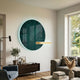 Lumea Jade Green 3D LED Crystal Porcelain Wall Art by Giant Sculptures mounted above a walnut console in a bright living room with sofa and armchair.