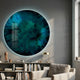 Lumea Textured Turquoise 3D LED Crystal Porcelain Wall Art by Giant Sculptures, circular teal-blue burst design backlit above a bookshelf in a living room.
