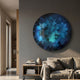 Lumea Textured Deep Blue 3D LED Crystal Porcelain Wall Art by Giant Sculptures mounted on a grey wall above a console and beige sofa in a modern living room.