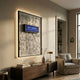 Illume Techscape 3D LED Wall Art by Giant Sculptures, mounted above a walnut sideboard with armchair and lamp, blue-lit logotype glowing against textured grey relief.