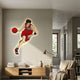 Enlustra II Game On UV Wood LED Wall Art by Giant Sculptures showing an anime basketball player in a red Shohoku #11 jersey, glowing above a wooden console in a modern living room.