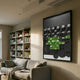 Obscura Black & Green Geometric 3D Wooden Wall Art by Giant Sculptures displayed above a grey sofa in a living room beside a tall white bookshelf.