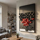 Obscura Black & Red Geometric 3D Wooden Wall Art by Giant Sculptures displayed on a pale wall in a modern living room beside a bookshelf and grey sofa.