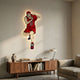 Enlustra III Game On UV Wood LED Wall Art by Giant Sculptures showing an anime basketball player in red #10 jersey, mounted above a walnut console with books and lamp.