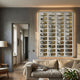 Muraluxe Gold & Black Curved Mosaic 3D Wooden Wall Art by Giant Sculptures displayed above a beige sofa in a grey living room with backlighting.
