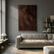 Serica Brown Scale Textured Vertical 3D Wooden Wall Art by Giant Sculptures mounted above a linen sofa in a grey-walled living room with shelving.