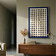 Artiora Blue Edge & Wood Block Modular Grid 3D Wall Art by Giant Sculptures, mounted above a walnut sideboard with pampas grass, books, and a brass lamp.