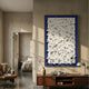Artiora Blue Edge & White Abstract Wooden Shard 3D Wall Art mounted in a sunlit modern living room above a walnut sideboard near a leather chair.