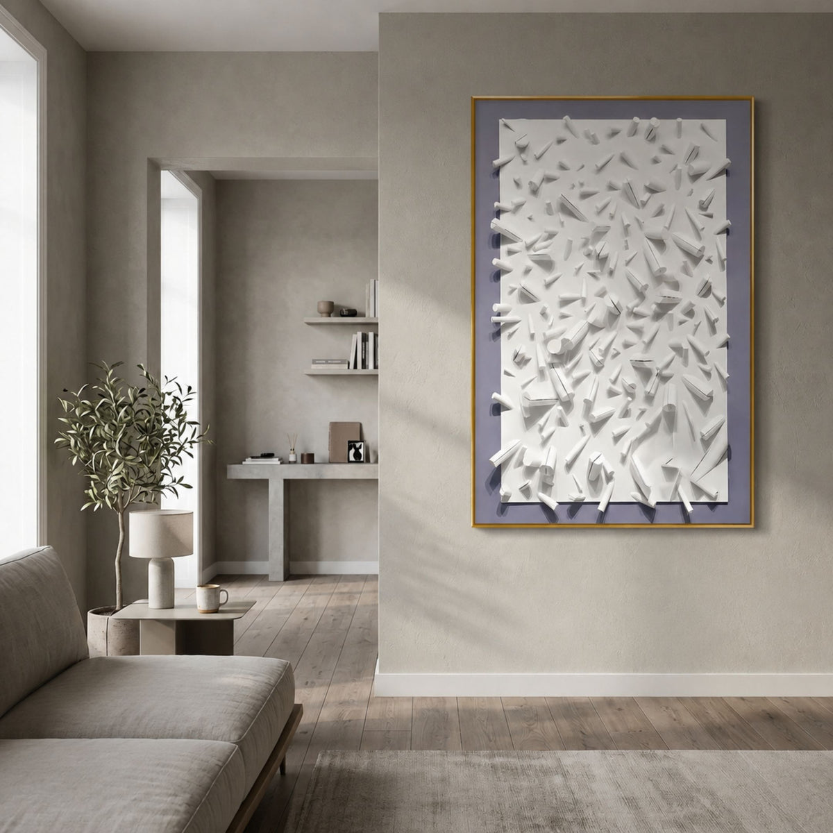 Artiora Green Edge & White Abstract Wooden Shard 3D Wall Art with gold trim displayed on a beige wall in a modern living room with grey sofa and olive tree.