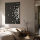 Fragmenta White Wooden Cube Scatter On Black Canvas 3D Wall Art by Giant Sculptures mounted above a linen-dressed bed with a wooden side bench and vase.