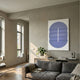 Ellipse Lavender Oval Wood 3D Canvas Wall Art by Giant Sculptures displayed in a sunlit living room above a sideboard with a plant, beside a grey sofa.