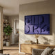 Formate Royal Purple Geometric Wood Painted 3D Wall Art by Giant Sculptures mounted above an oak sideboard in a Nordic living room with bookshelf and plant.