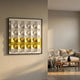 Tessera White & Yellow II Geometric Wood 3D Wall Art by Giant Sculptures, mounted in a Nordic living room above a wooden coffee table beside a draped linen sofa.