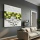 Structura Verdant Green & White 3D Wooden Square Wall Art by Giant Sculptures displayed on a grey living room wall above a beige sofa and shelf.