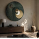 Orbitra Green Reflective Circular 3D Wall Art with radial green lines and three mirrored discs, displayed above a dark wood sideboard with lamp and vase.
