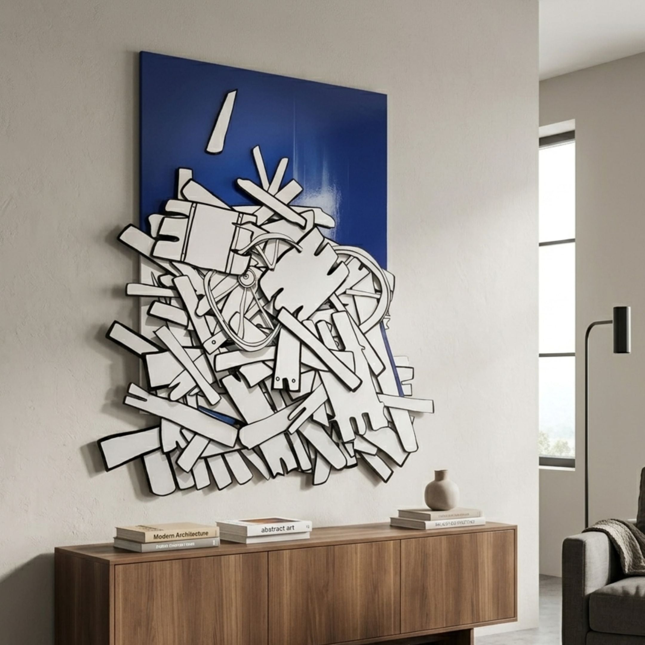 Assemblia Blue Hand-Painted Wood Graffiti Wall Art by Giant Sculptures displayed above a walnut sideboard with books and a vase in a modern living room.