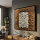 Terracova Warm Ochre Frame Textured Cardboard Square 3D Wall Art by Giant Sculptures displayed above a wooden console in a modern living room with bookshelf.