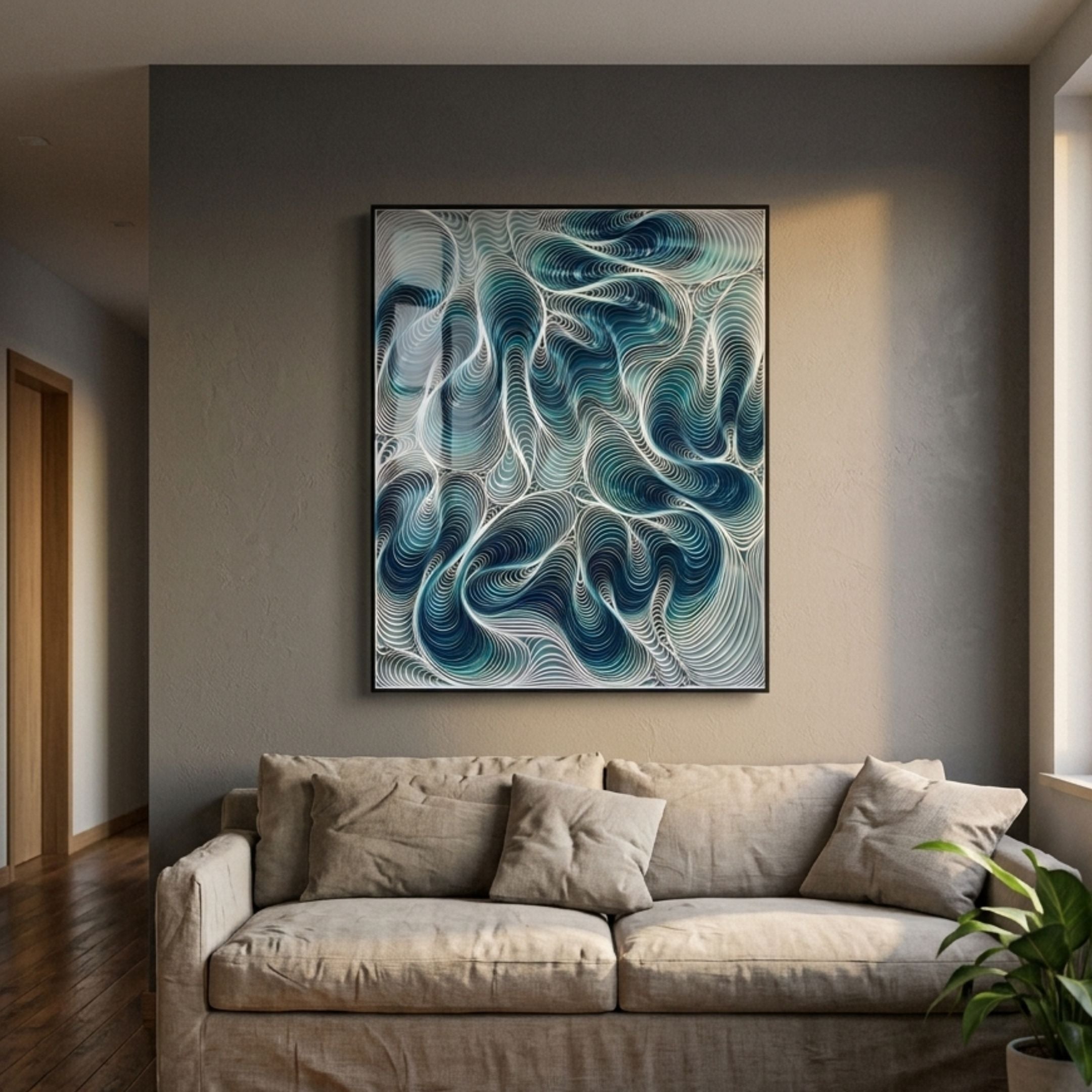 Filigree Ocean Waves Quilling Paper Wall Art in blue, teal, and white swirling layers, framed in black above a beige sofa in a grey-walled living room.