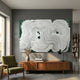 Calmant Green & White Abstract Hand-Painted Wall Art by Giant Sculptures displayed above a mid-century walnut sideboard with a green armchair and bookshelf.