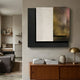Astra Stardust Gold Textured Wood Carving 3D Wall Art with white plaster panel and speckled gold-flecked earth-toned panel on black backing, mounted above a walnut sideboard with brass lamp.