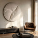 Selene IV White Sandstone Textured 3D Wood Relief Wall Art mounted above a dark wood console in a sunlit living room with a brown leather armchair.